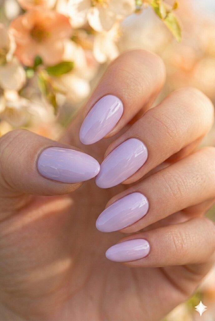 Soft lavender spring nails with dreamy purple shade on oval shaped nails, calming elegant manicure for spring 2026