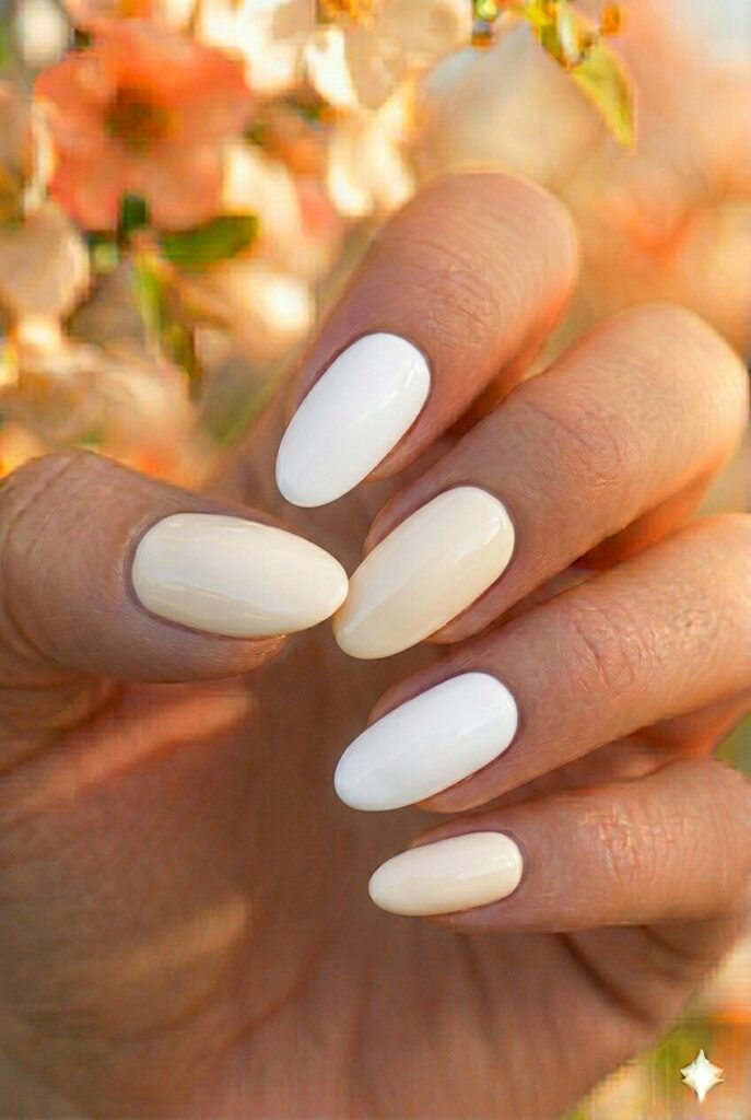 Cream and white combo spring nails with alternating cream and white polish, minimalist elegant manicure for spring 2026