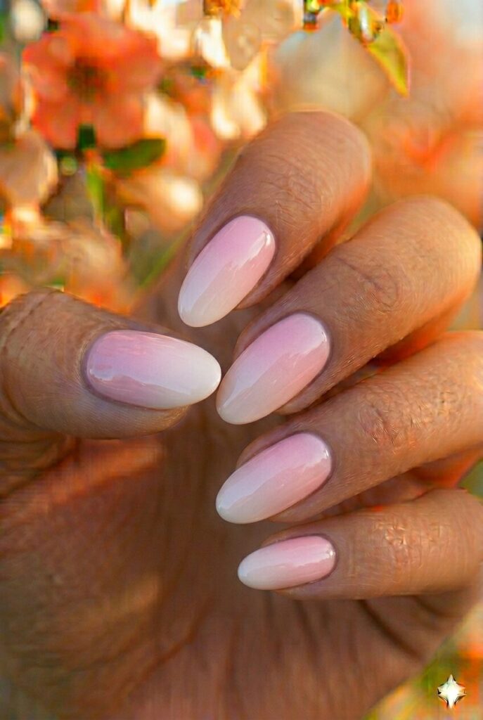 Pastel gradient spring nails fading from pink to white ombre effect, dreamy artistic manicure for spring 2026