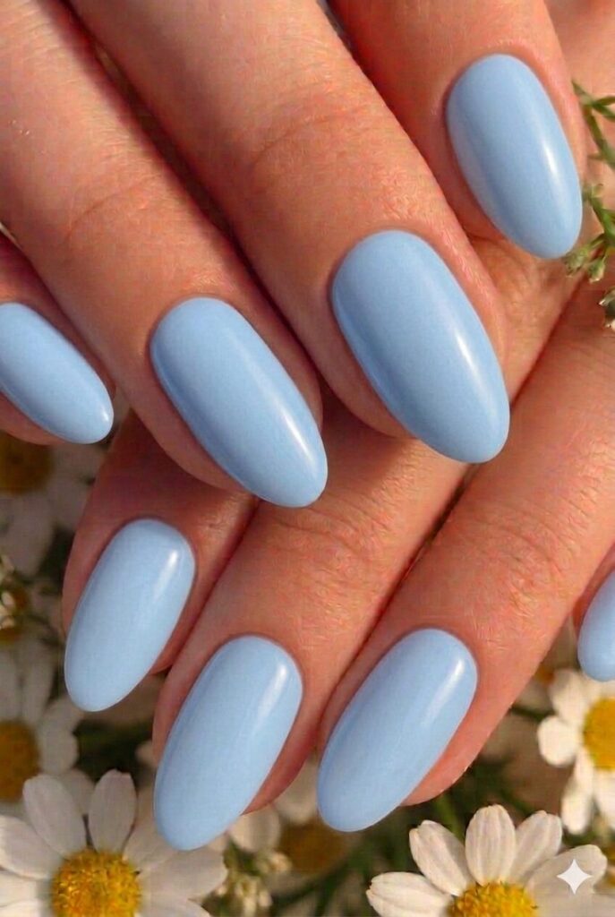 Powder blue pastel Easter nails with serene calming shade like clear spring skies, peaceful classic manicure 2026