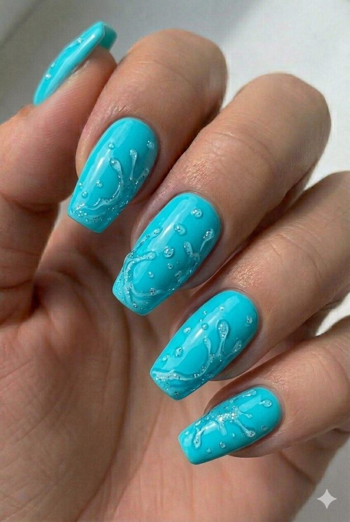 Aqua splash bright summer nail design with bright aqua blue shade like pool water fresh energetic, fun summer nail idea 2026