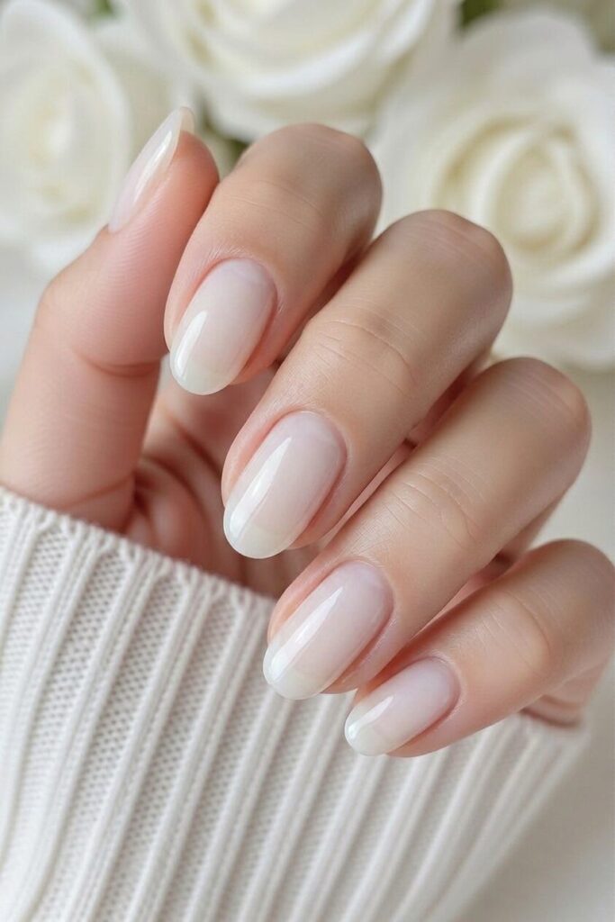 Clean white jelly prom nails with a soft sheer finish for a fresh and modern formal look