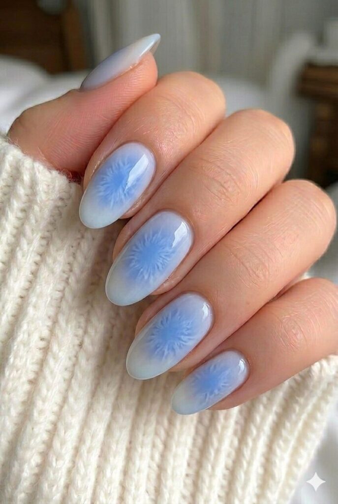 Cornflower aura blue prom nails with a glowing blue center and soft faded edges