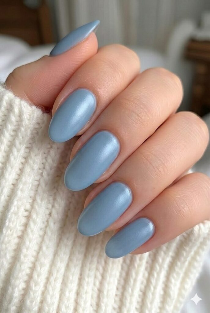 Dusty blue satin prom nails with muted blue tone and smooth satin finish
