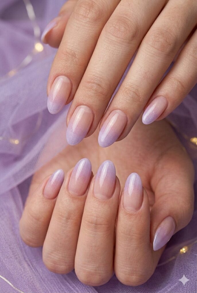 Lavender tulle ombre purple prom nails fading from nude into soft lavender tips