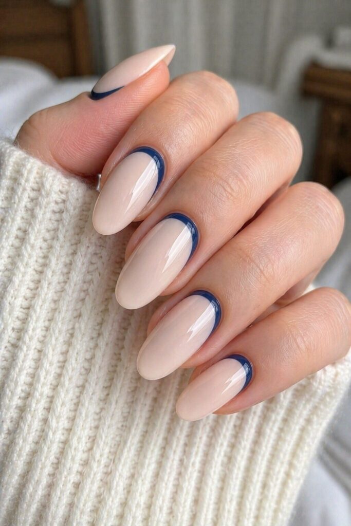 Navy moonline blue prom nails with pale base and deep navy curved moon accent