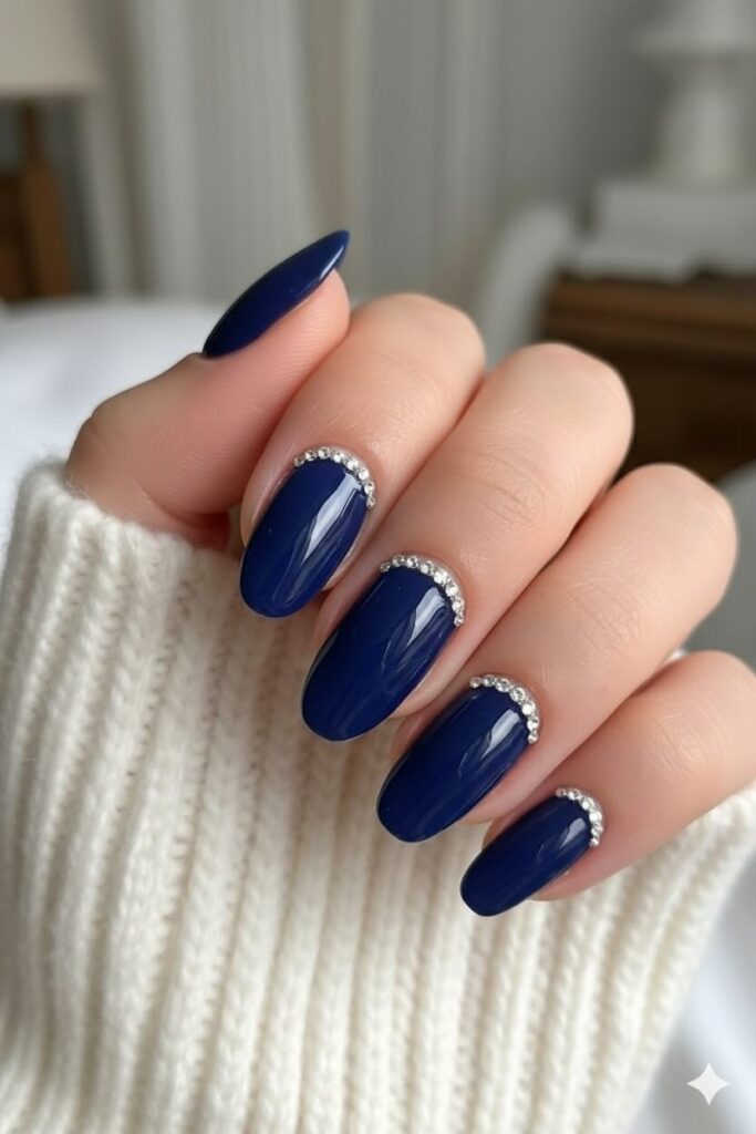 Navy pearl frame blue prom nails with rich navy base and pearl cuticle frame detail