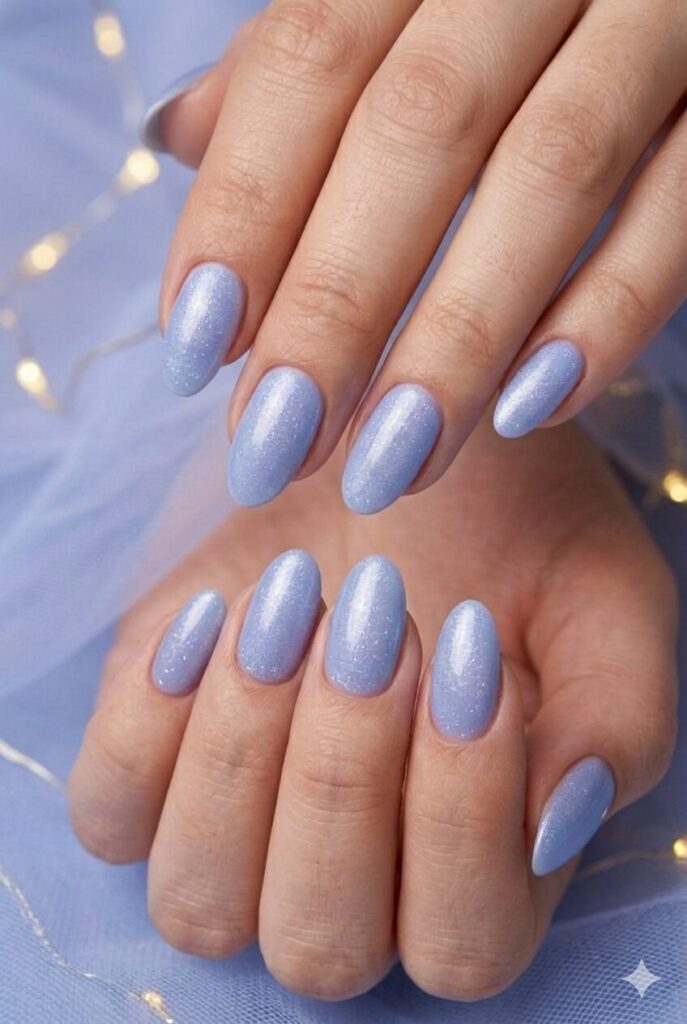 Periwinkle dream dust purple prom nails with a light blue-purple shade and fine shimmer