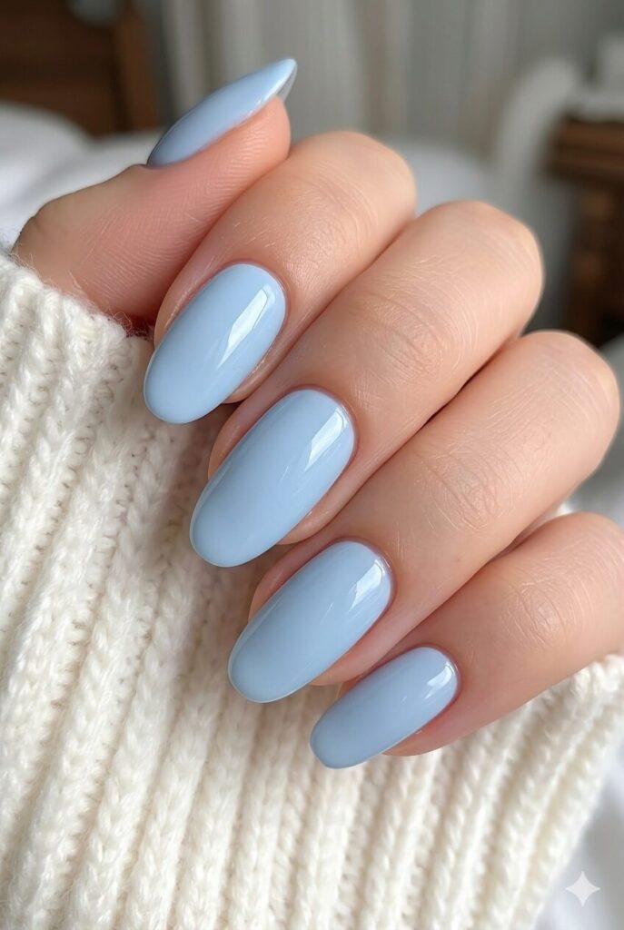 Powder blue gloss prom nails with a soft baby blue shade and clean shiny finish