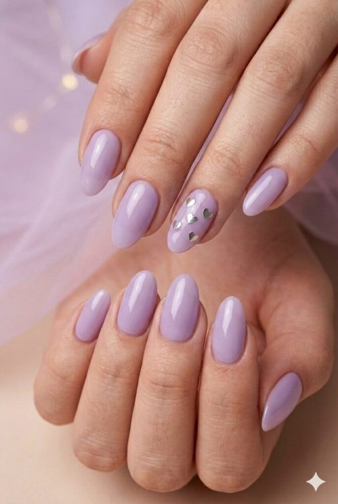 Soft violet heart glaze purple prom nails with pale violet base and tiny heart details
