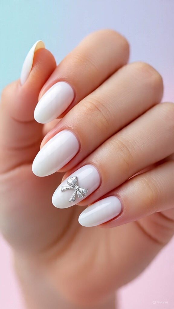 White bow accent prom nails with a cute feminine detail for a sweet dressy manicure