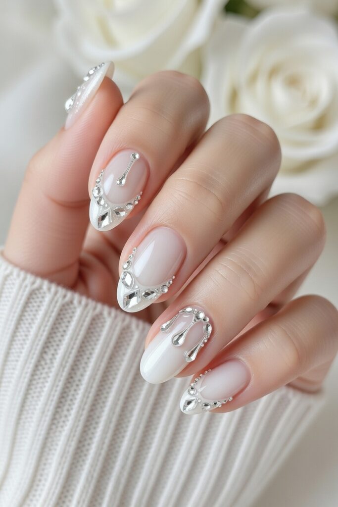 White crystal drip prom nails with glossy shine and crystal detail for a glam formal style