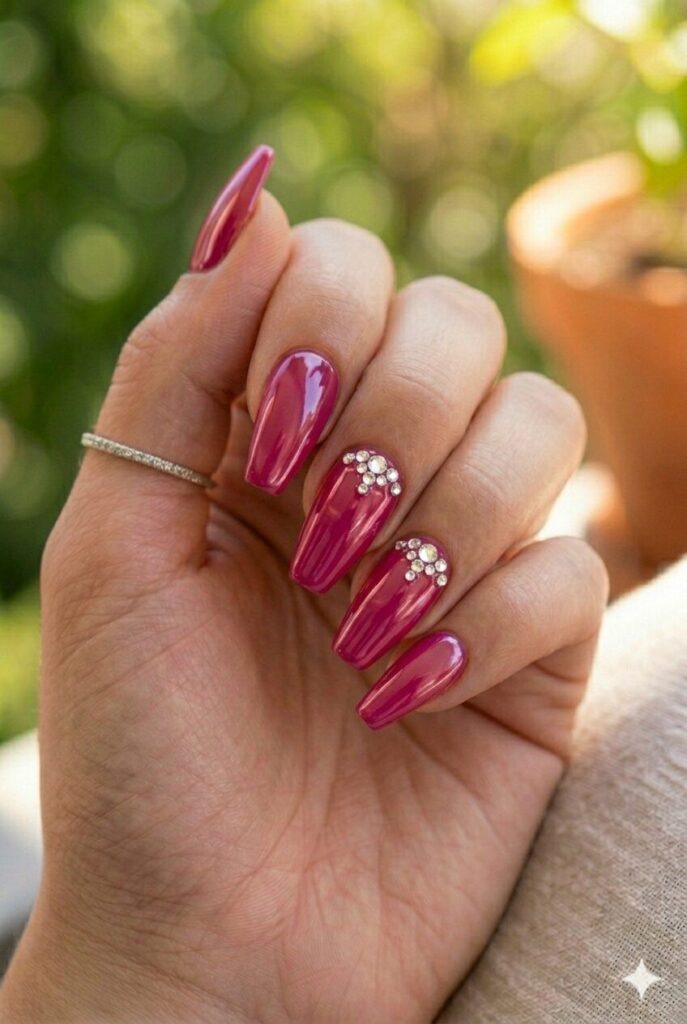 Deep berry pink coffin nails with crystal gem accent fingers