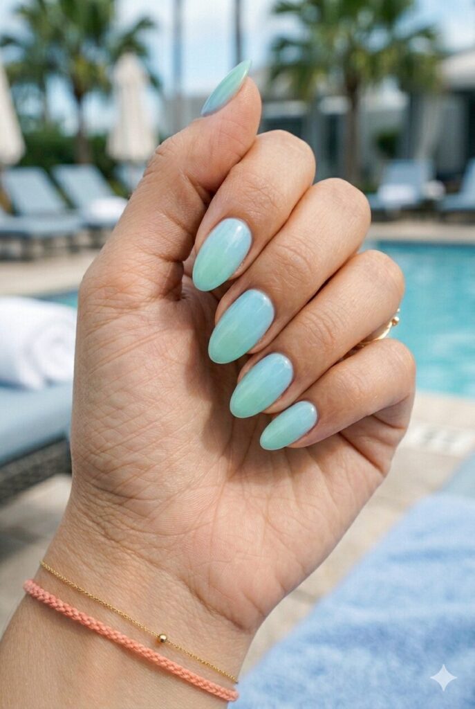 Short almond nails with aqua and mint seaglass ombre blend