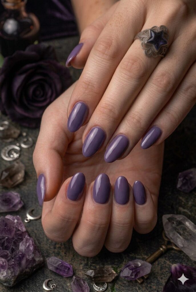 Short oval nails with glossy dark lavender purple moody polish