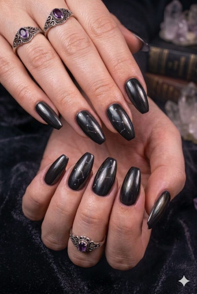 Coffin almond nails with smoky black chrome mirror finish