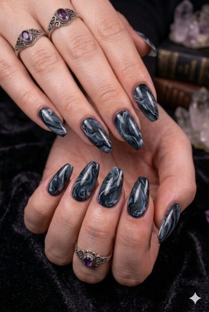 Coffin almond nails with dark gray black and white marble swirl art
