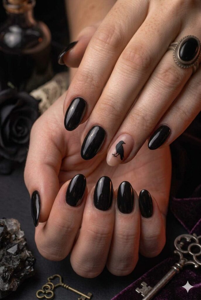 Short almond nails with black base and tiny black raven accent