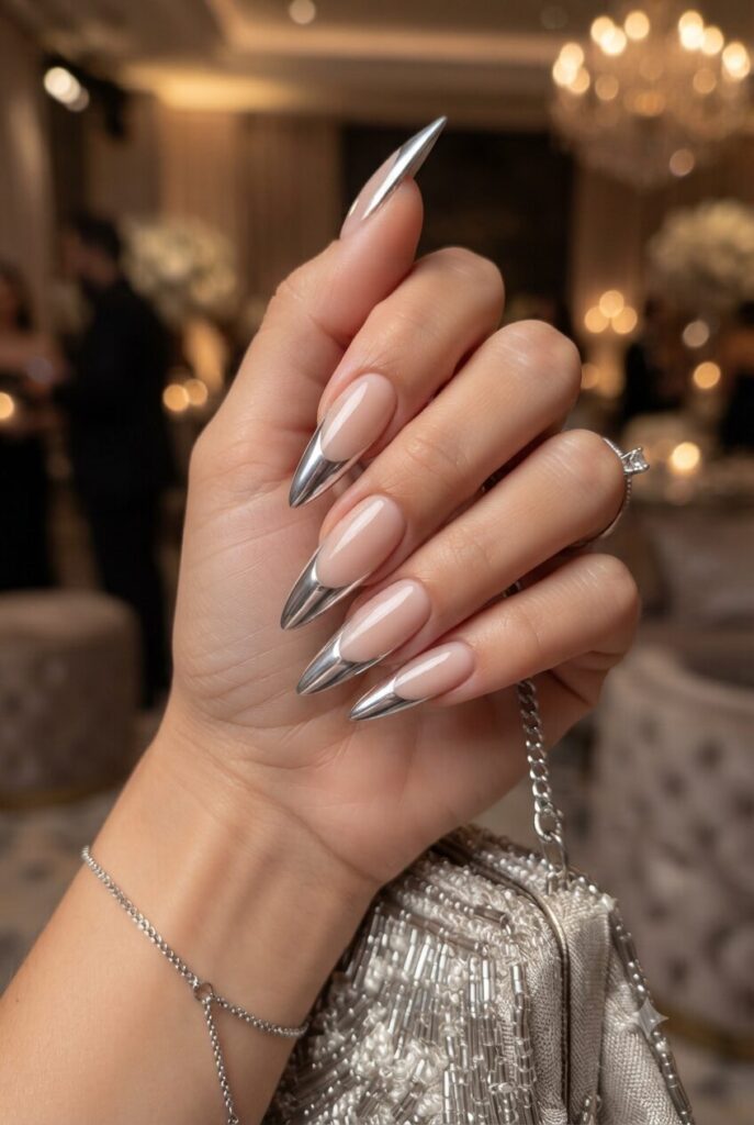 Long stiletto nails with soft silver chrome French tips