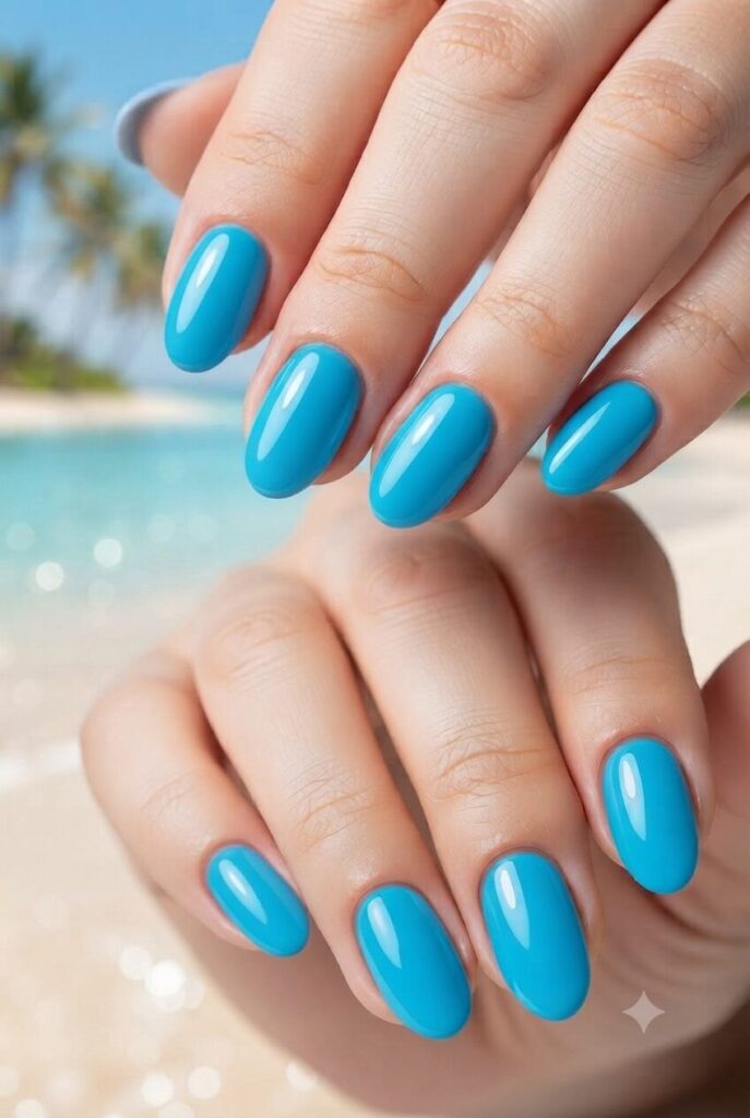 Short almond nails with glossy bright Caribbean blue polish