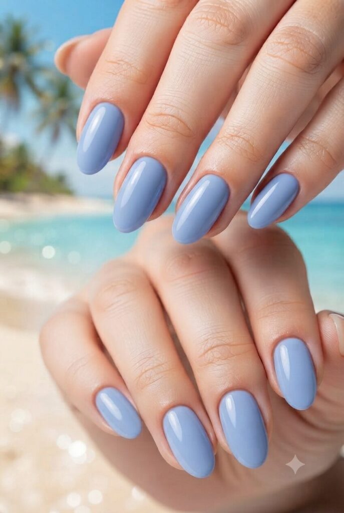 Short oval nails with glossy soft cornflower blue polish