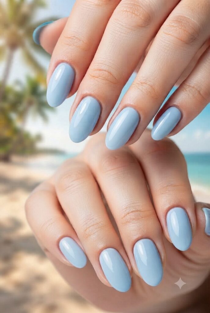 Short oval nails with glossy soft powder blue polish