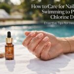 How to care for nails after swimming featured image showing water droplets on hand with cuticle oil nearby
