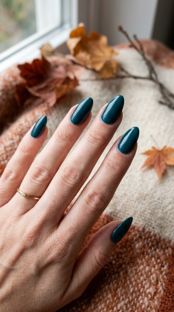 Deep teal nails for a jewel-tone September look
