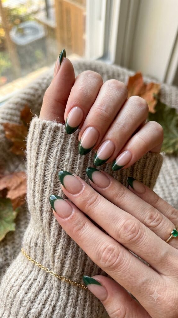 Nude nails with forest green side French tips