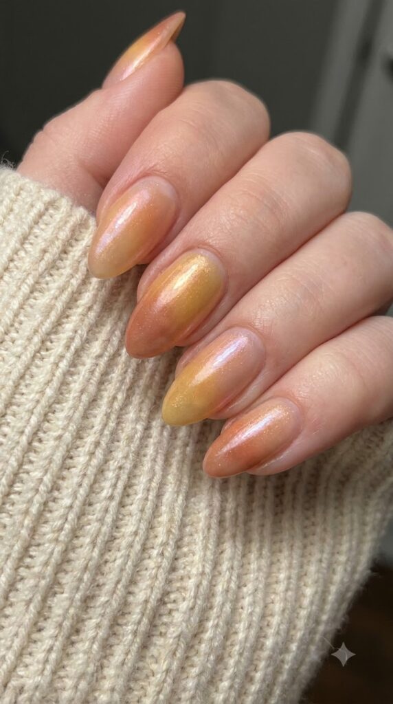 Almond nails with gradient sheer peach yellow terracotta wash