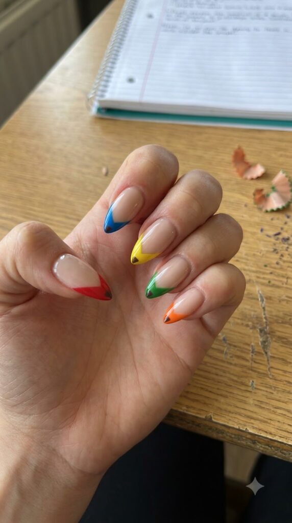 Almond nails with pointed crayon-style colored tips