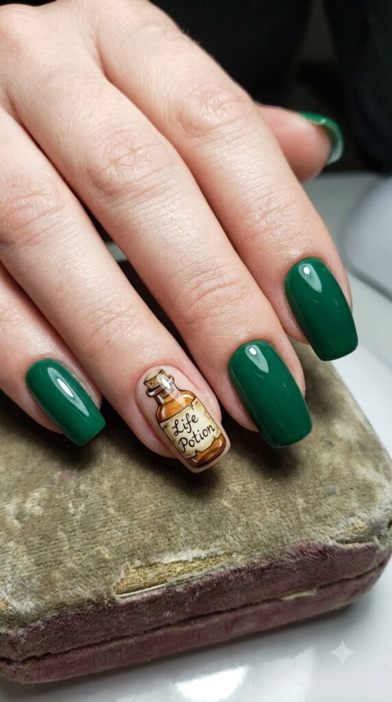 Squoval emerald green nails with vintage glass potion bottle art