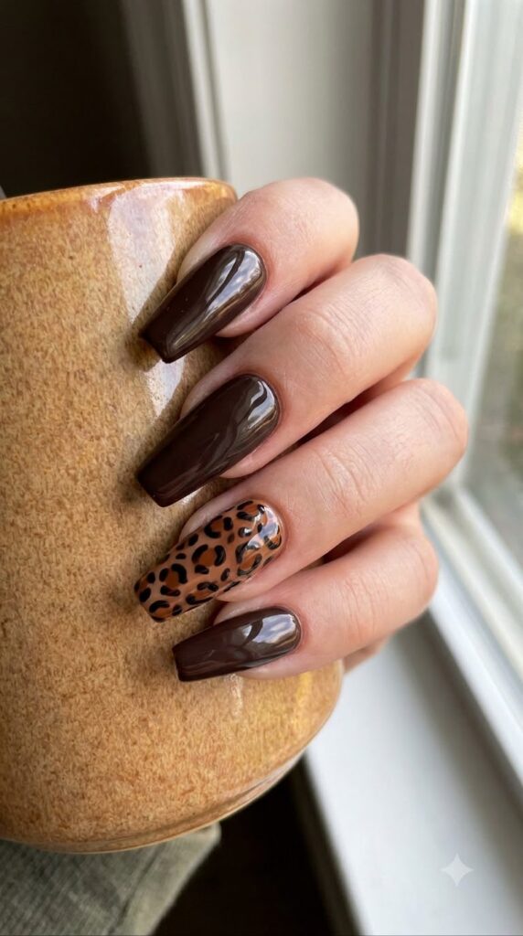 Coffin dark espresso brown gel nails with a brown and black leopard print accent