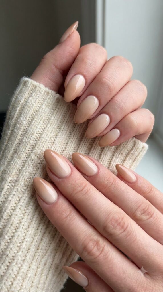Almond nails with cream base fading smoothly into warm latte brown tips