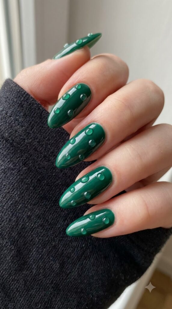 Long almond emerald green nails with raised clear 3D gel dew droplets