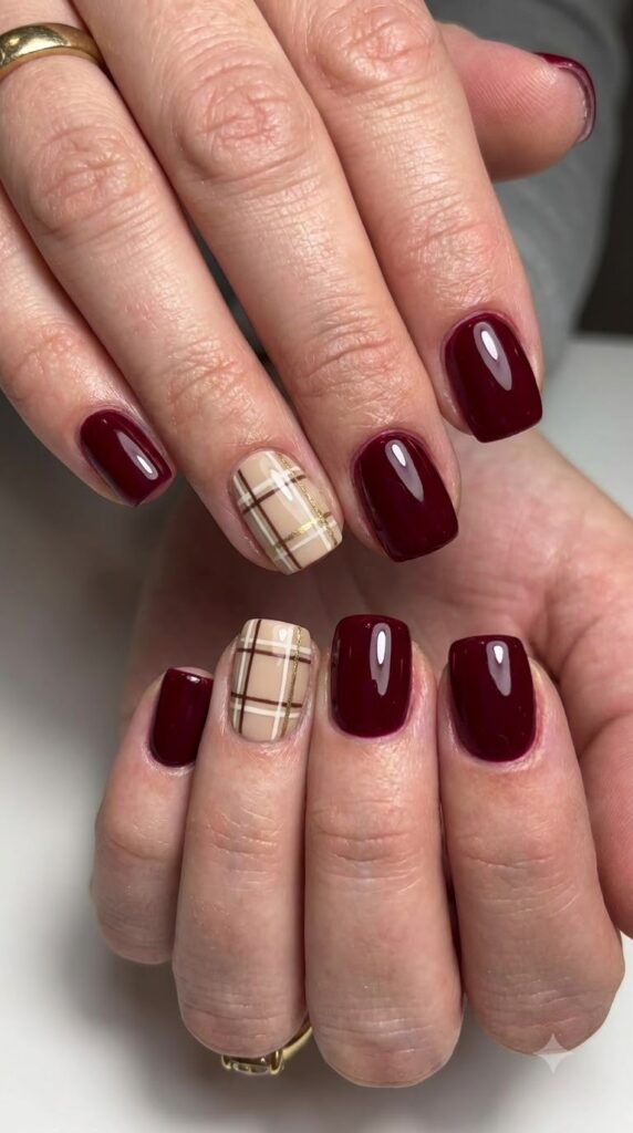 Short square burgundy red gel nails with cream brown gold plaid grid art