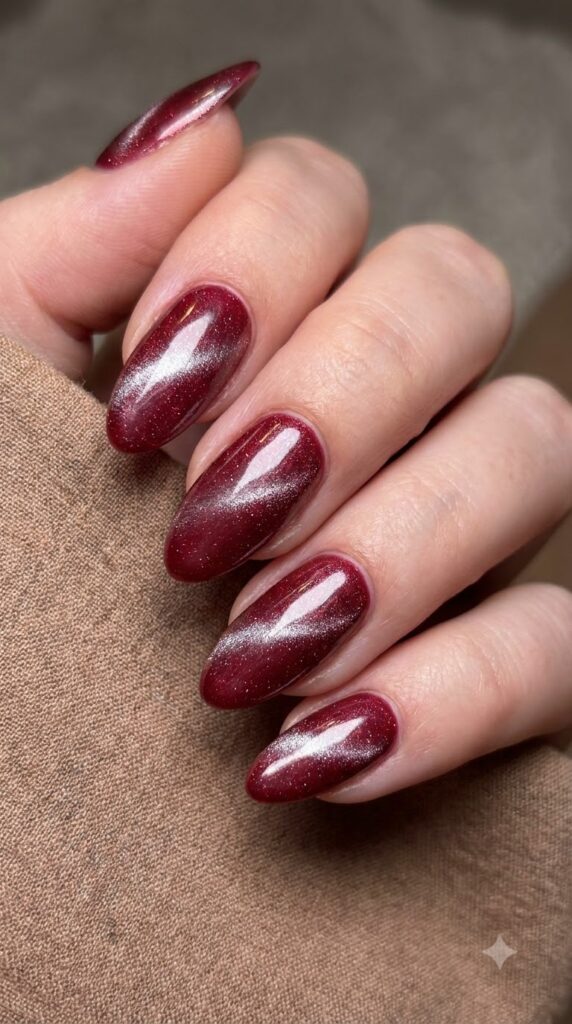Medium almond cranberry magnetic cat-eye nails with glazed chrome finish