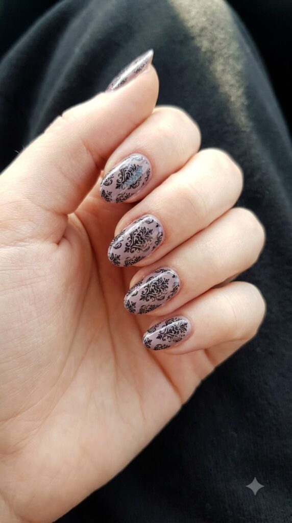 Short almond lavender nails with black Haunted Mansion damask art