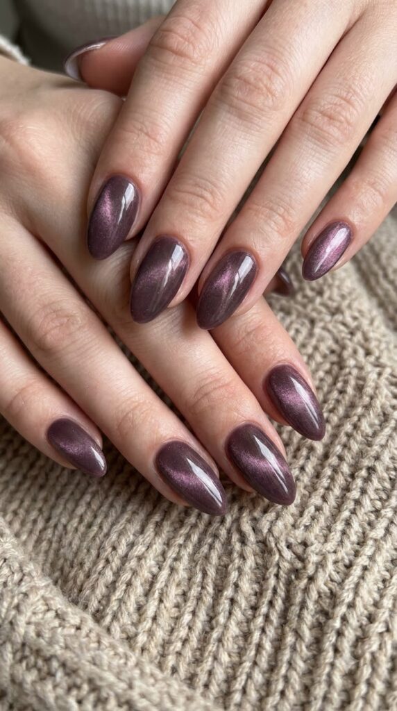 Medium almond smoky mauve magnetic cat-eye gel nails with 3D shimmer