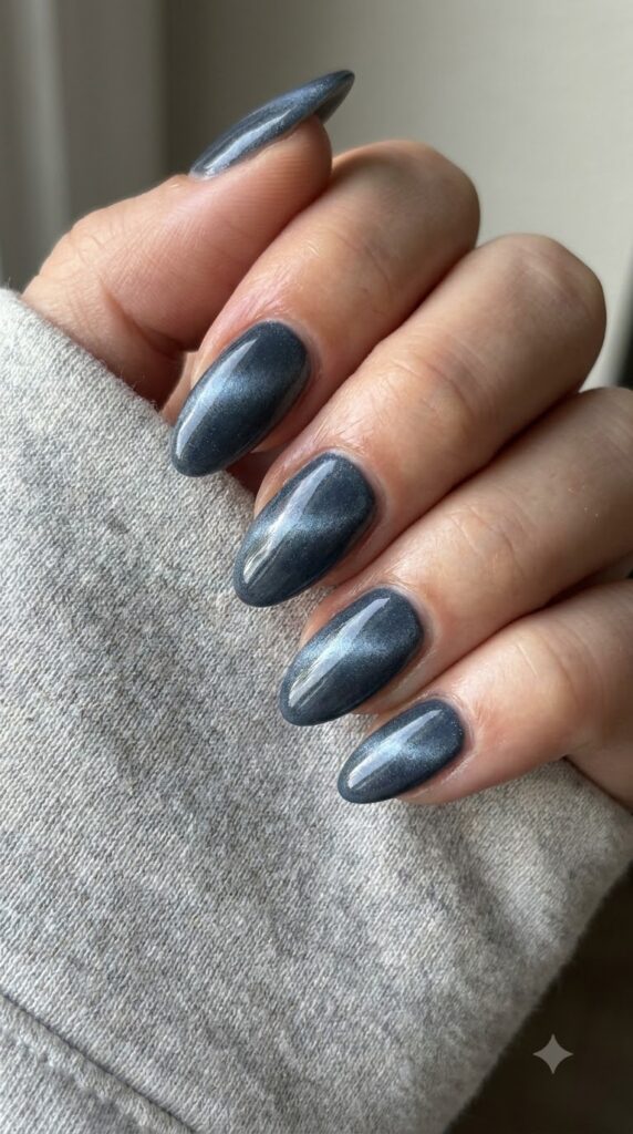 Medium almond steel blue magnetic cat-eye nails with velvety 3D shimmer