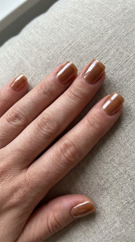 Short square sheer toasted caramel brown nails with glazed chrome finish