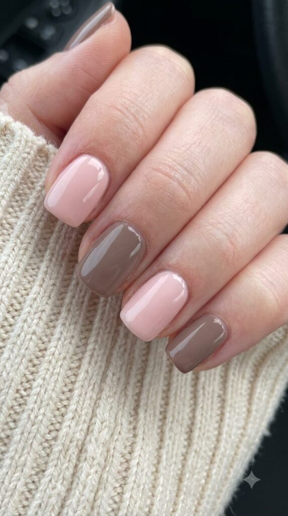 Short square nails alternating solid soft blush pink and warm taupe brown