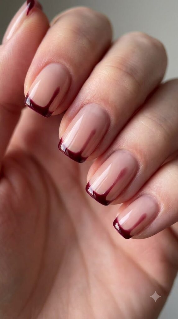 Short squoval nude nails with deep wine red dripping blood French tips