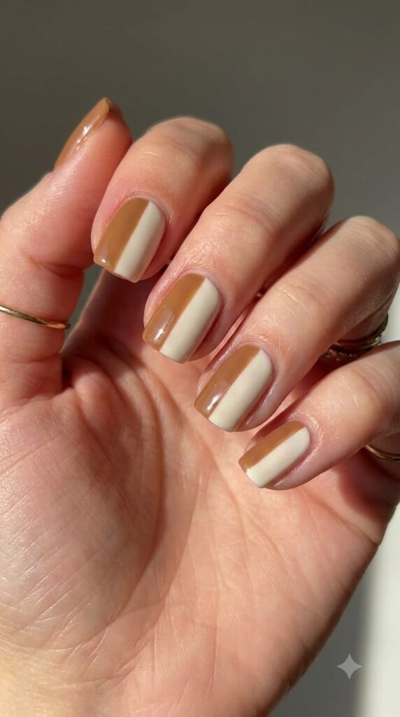 Short square nails split vertically with hazelnut brown and cream polish